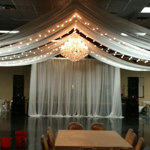 DesignLight chandelier and overhead voile fabric