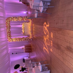 DesignLight backyard wedding lighting in tent